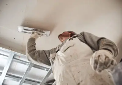 14-stock-photo-worksman-plastering-gypsum-walls-inside-the-house