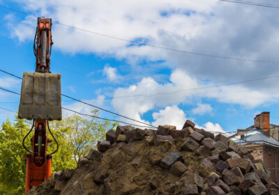 24-stock-photo-excavator-loader-machine-works-outdoors-at-city-bottom-view-16