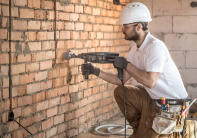 26-stock-photo-handyman-uses-jackhammer-for-installation-professional-worker-11